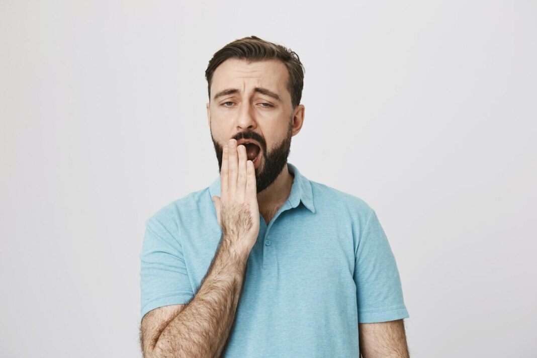 tired-bored-bearded-man-yawning-looking-reluctant_176420-187110