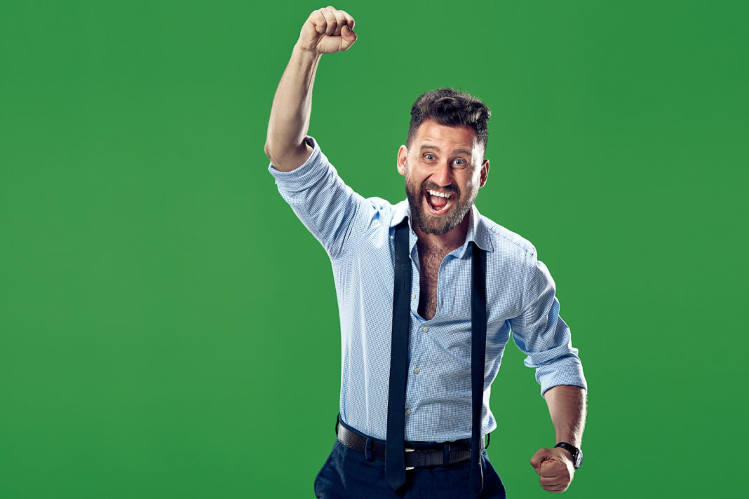 winning-success-happy-man-celebrating-being-winner-dynamic-image-caucasian-male-model-green-wall-victory-delight-concept-human-facial-emotions-concept0