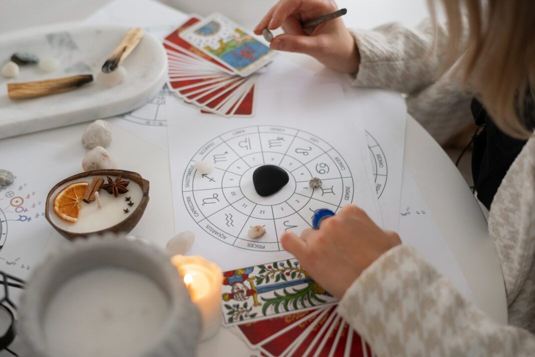 high-angle-woman-reading-tarot-home0