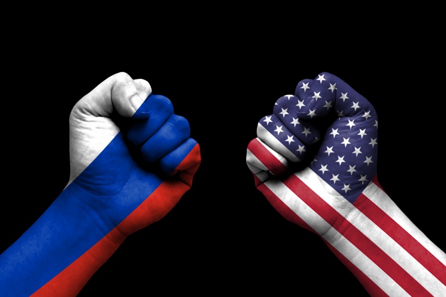Russia and USA conflict, international relations crisis, flag on human hand background concept0