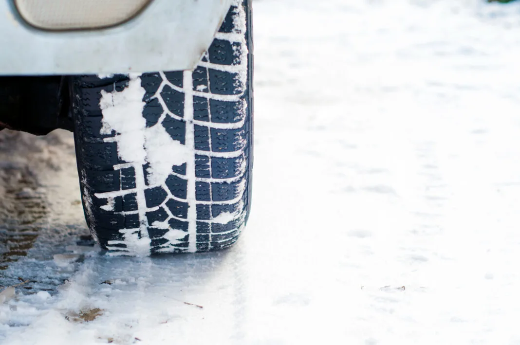 car-tires-on-winter-road-covered-with-snow-vehicle-on-snowy-alley-in-the-morning-at-snowfall car-tires-on-winter-road-covered-with-snow-vehicle-on-snowy-alley-in-the-morning-at-snowfall0